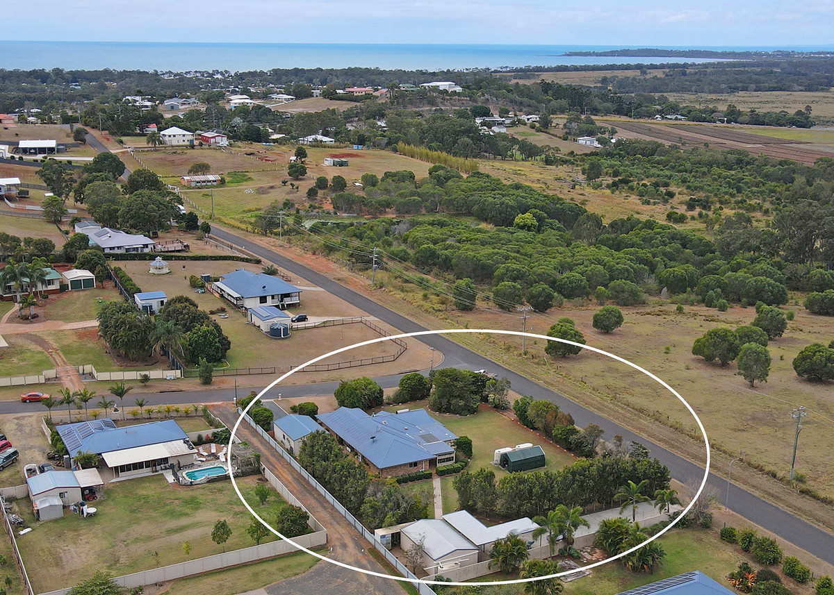 Sheds, sheds & more sheds with family home on a spacious half acre flat